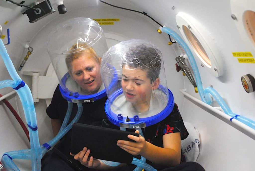 Hyperbaric oxygen therapy for treating autism